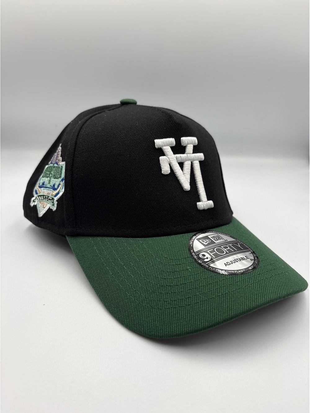 New Era 9FORTY Adjustable Black and Green Baseball Cap